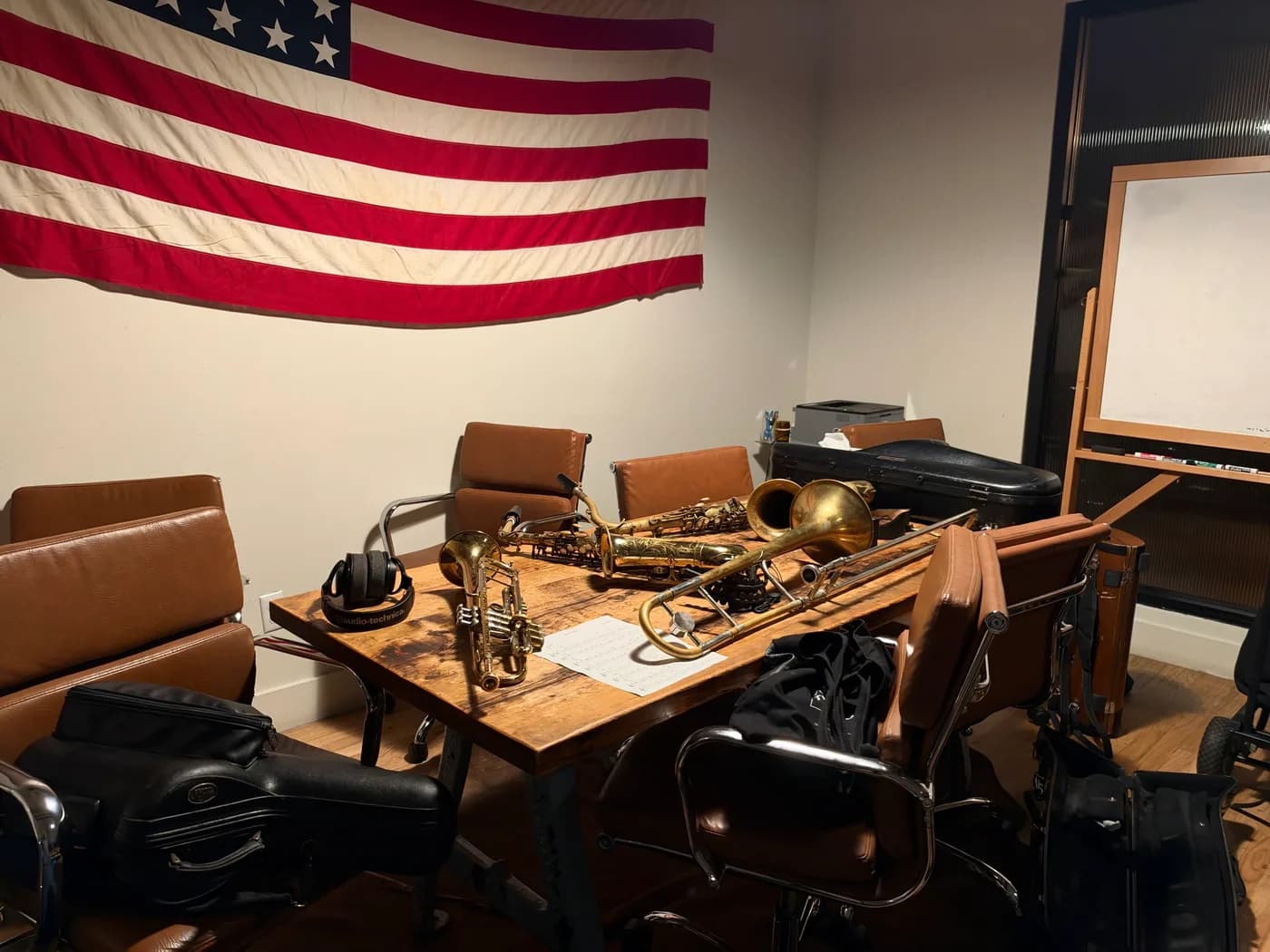Brass instruments resting on a table before a jazz night