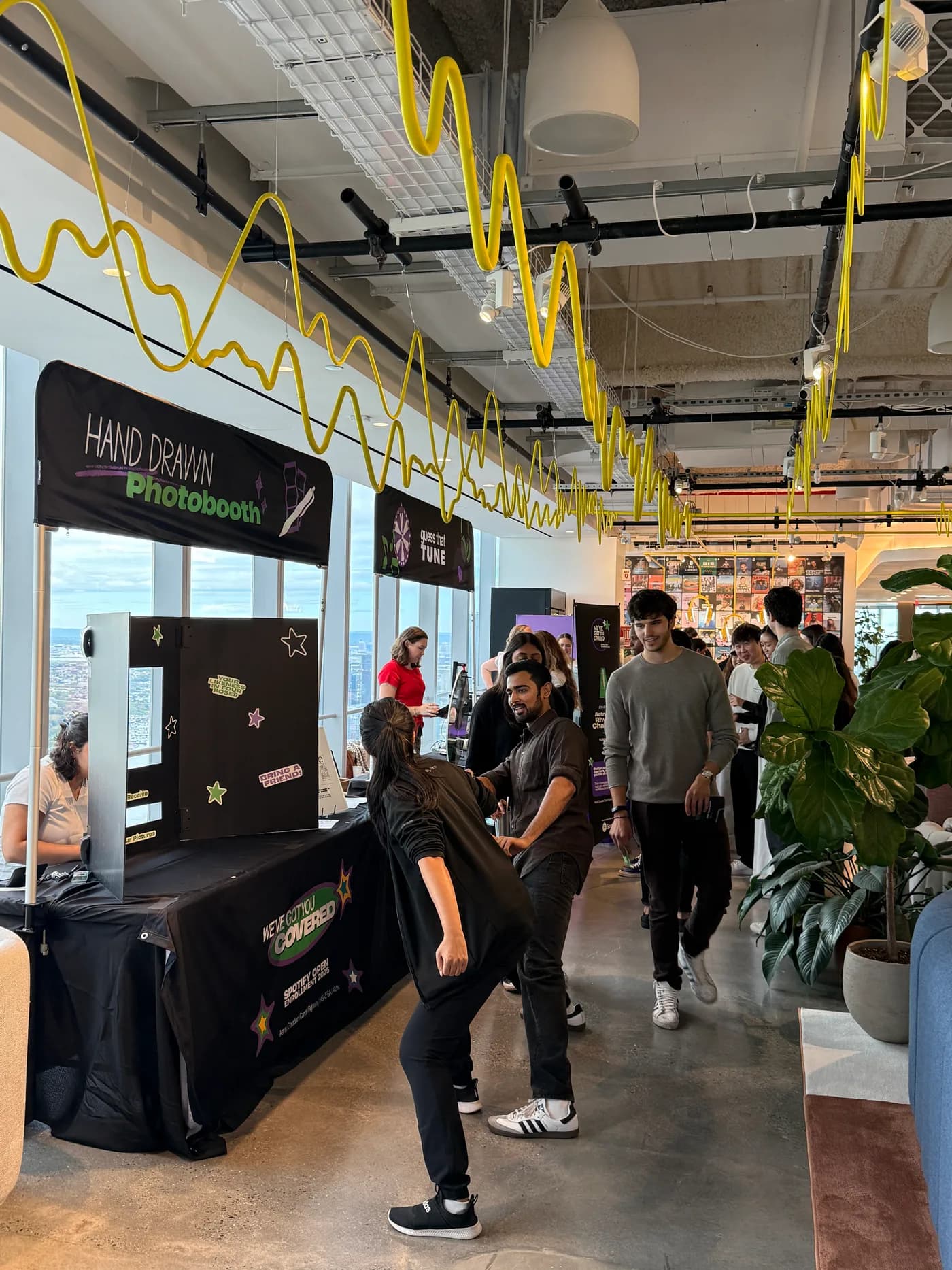 Employees exploring activity stations at the Spotify and Aetna benefits event
