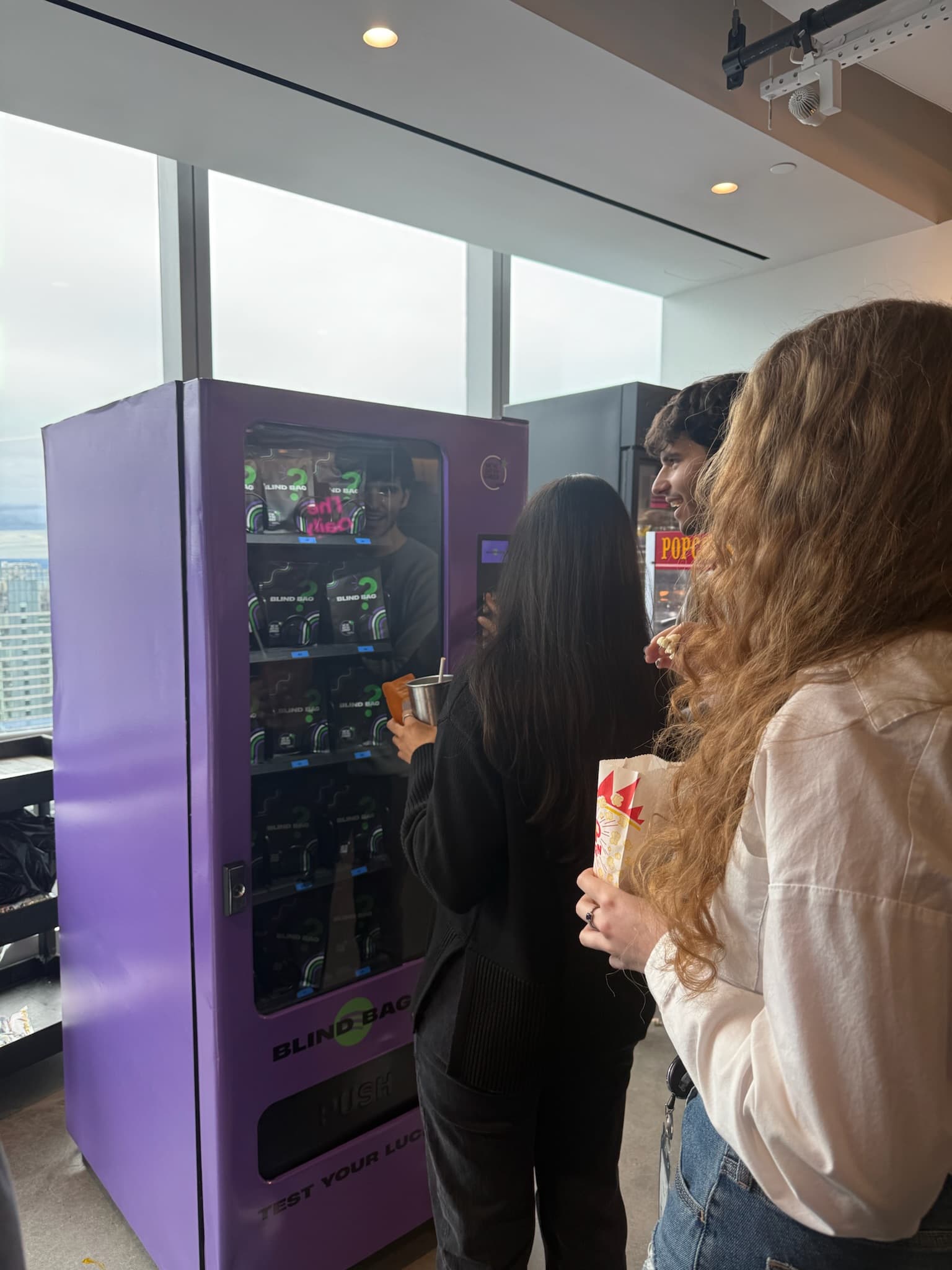 Custom branded blind box vending machine activation at corporate event